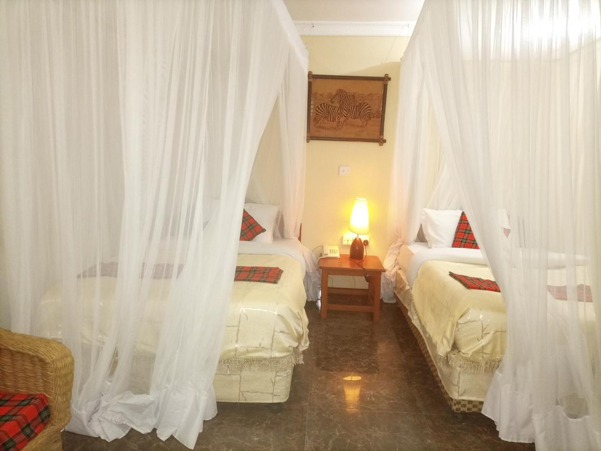 Karibu Heritage House Arusha Habitación foto